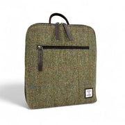 Maccessori Harris Tweed backpack in country green herringbone with a front zip pocket