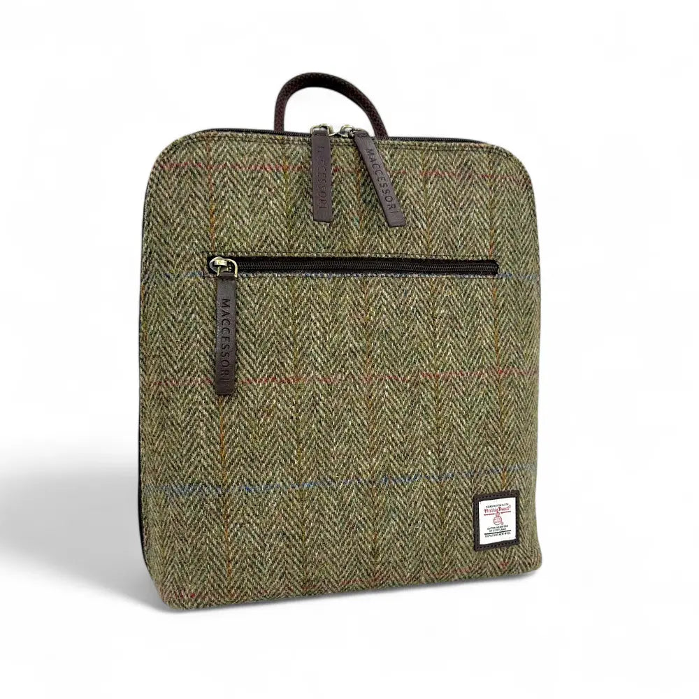 Maccessori Harris Tweed backpack in country green herringbone with a front zip pocket