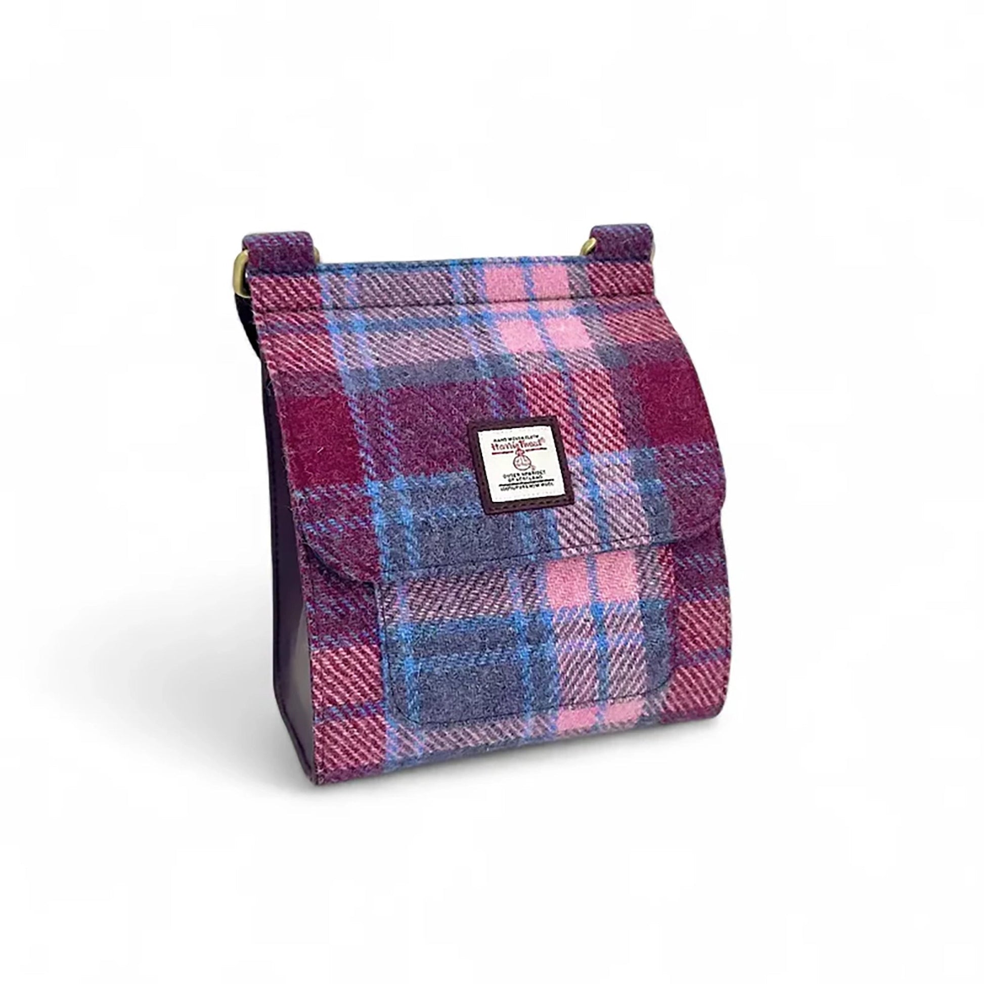 Pastel pink Harris Tweed medium satchel front view on white background