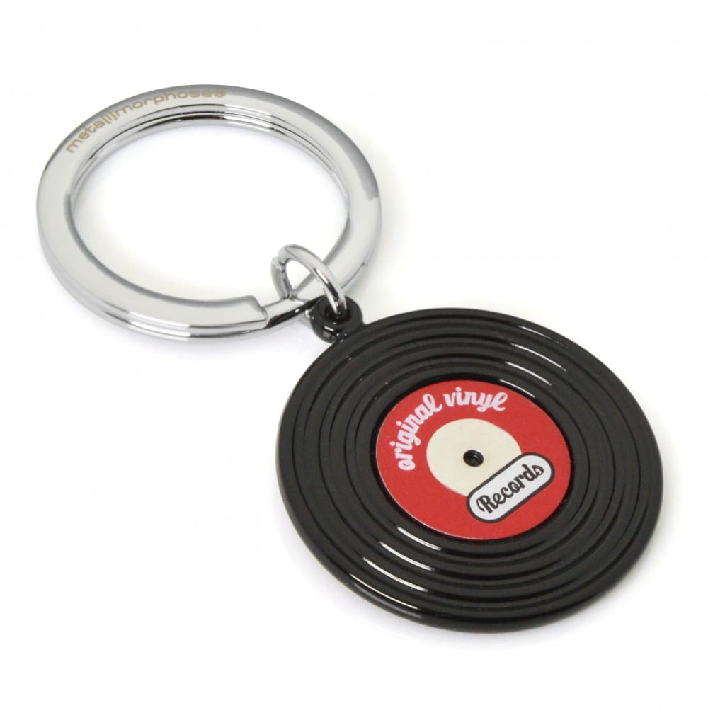 Black vinyl record keyring with red label and chrome split ring on white