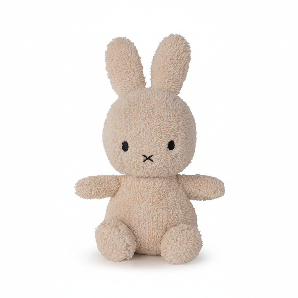Miffy sitting terry towelling soft toy in beige, 23cm, front view on white background