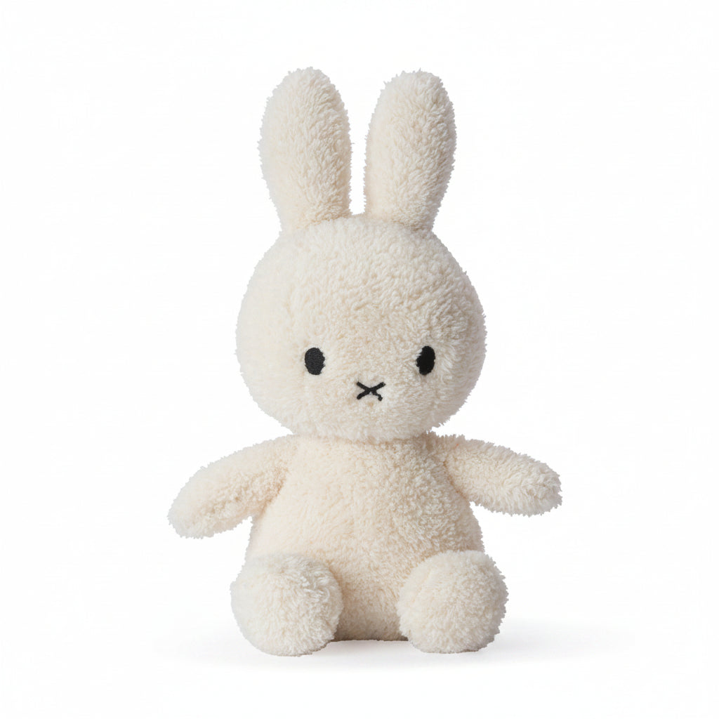 Miffy sitting terry towelling soft toy in cream, 23cm, front view on white background