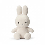 Miffy sitting terry towelling soft toy in cream, large 33cm, front view on white background
