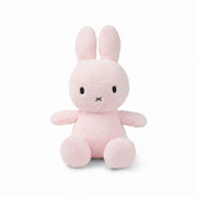 Miffy sitting terry towelling soft toy in light pink, large 33cm, front view on white background