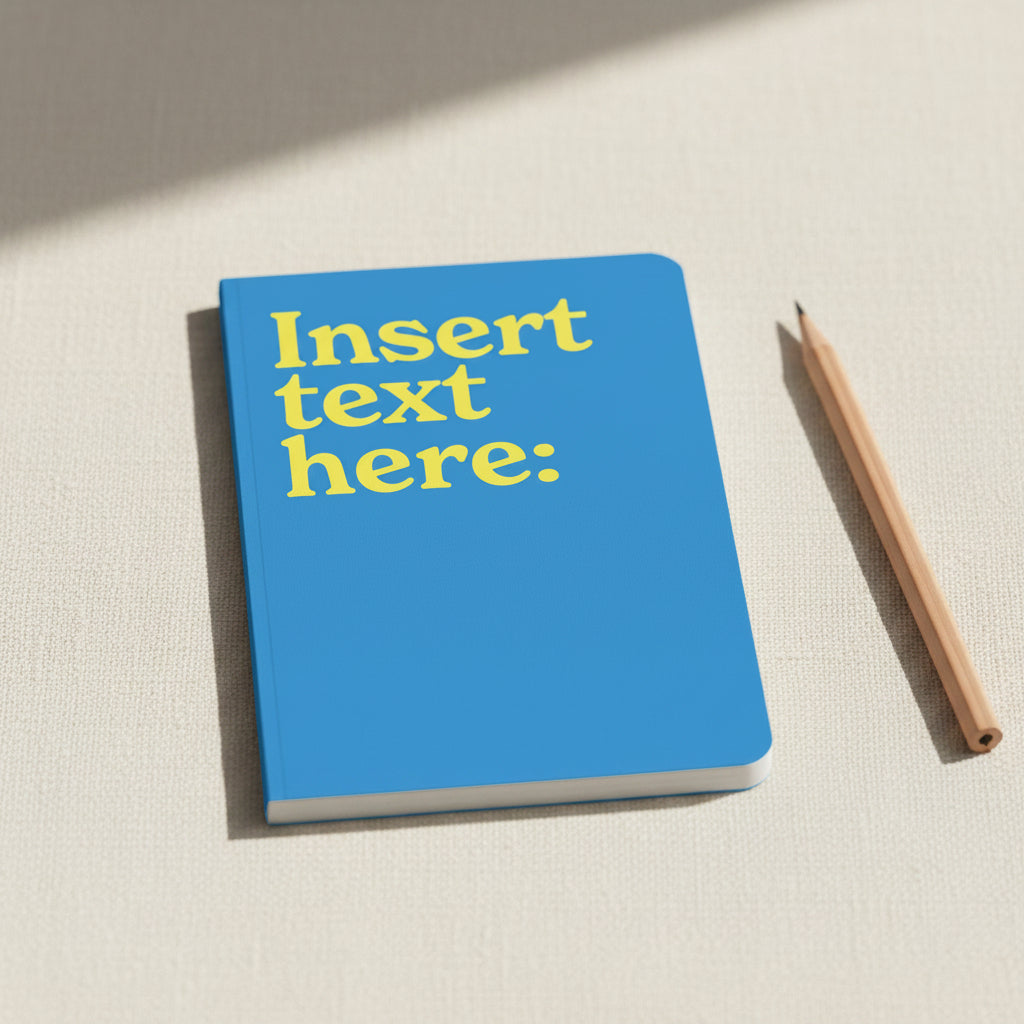 Insert Text Here neon A5 notebook shown flat on a white background