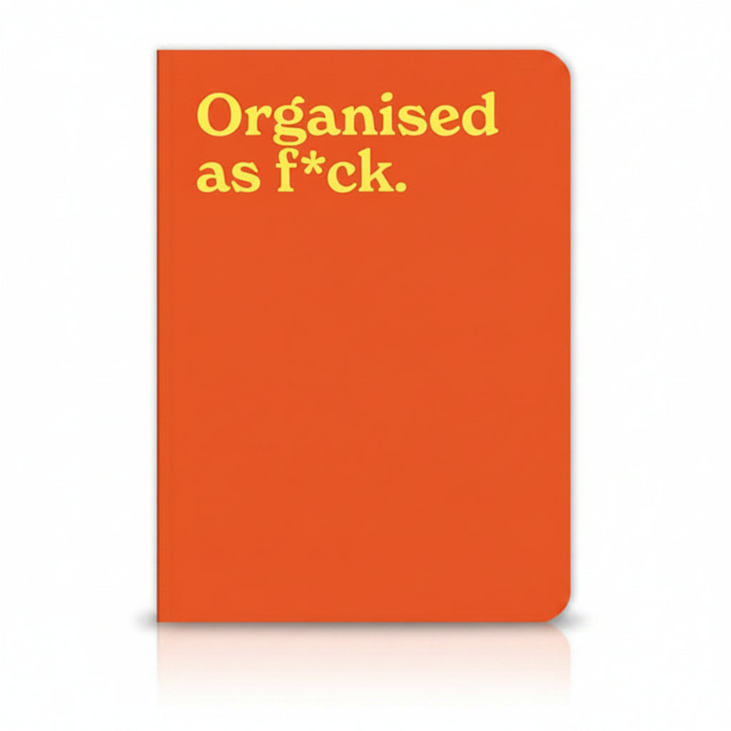 Organised as F*ck A5 notebook with orange cover and yellow lettering