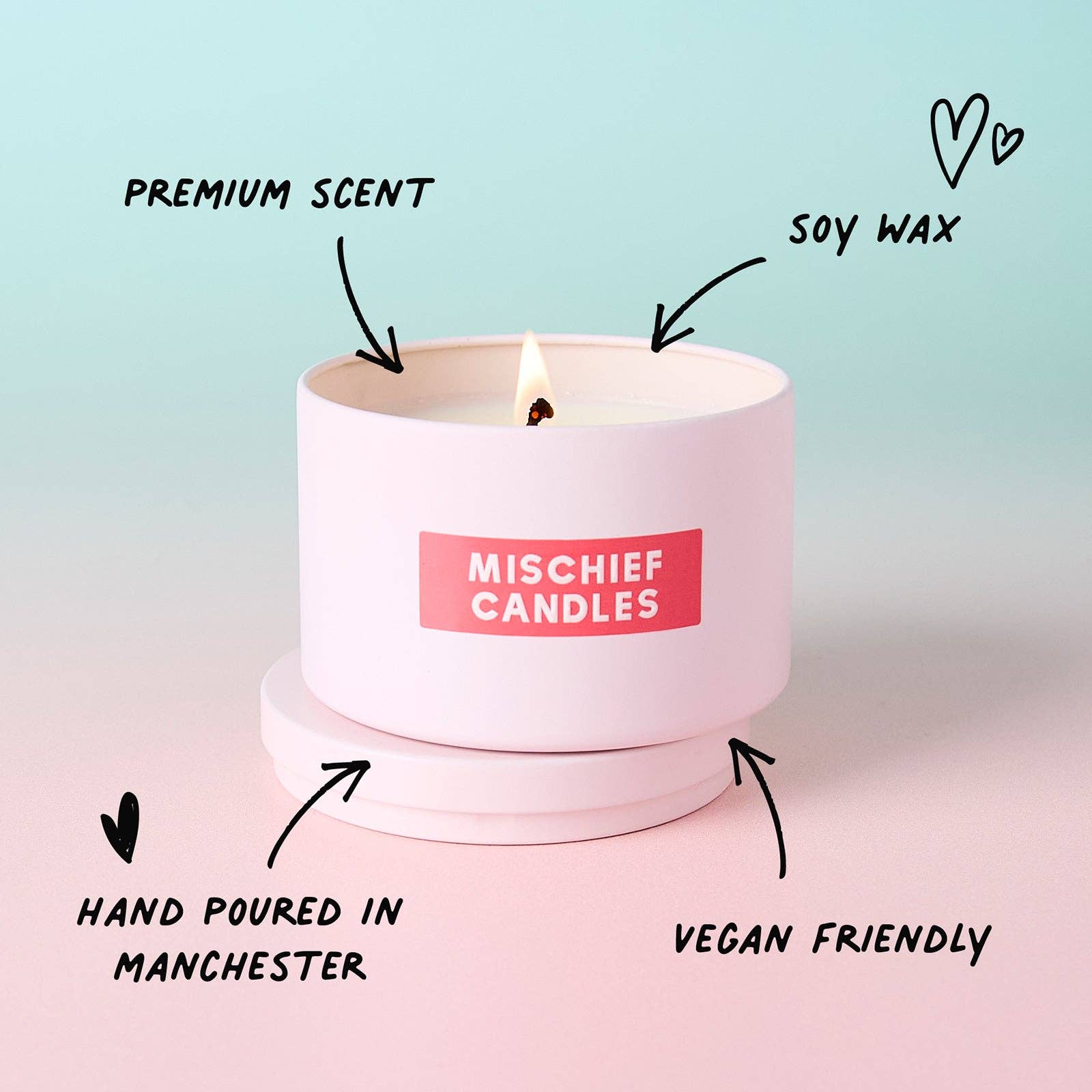 Pink tin soy candle with vegan friendly and hand poured feature notes