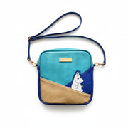 Moomin Gold Mini Bag flat lay showing front design with Moomin motif and gold logo plate.
