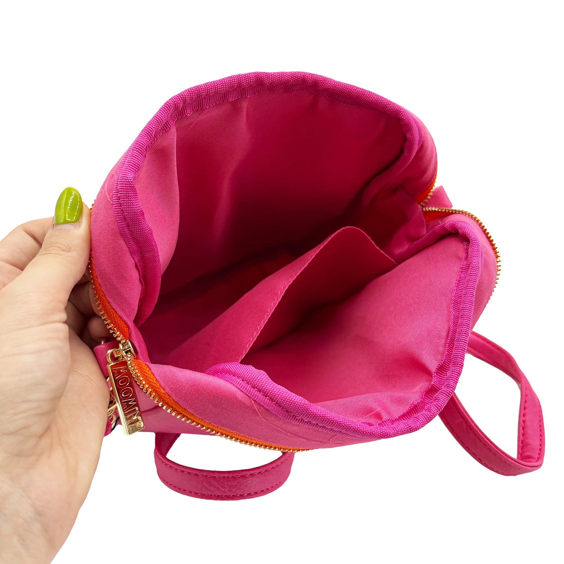 Interior of Moomin Snorkmaiden Mini Bag with pink cotton lining and open pocket.