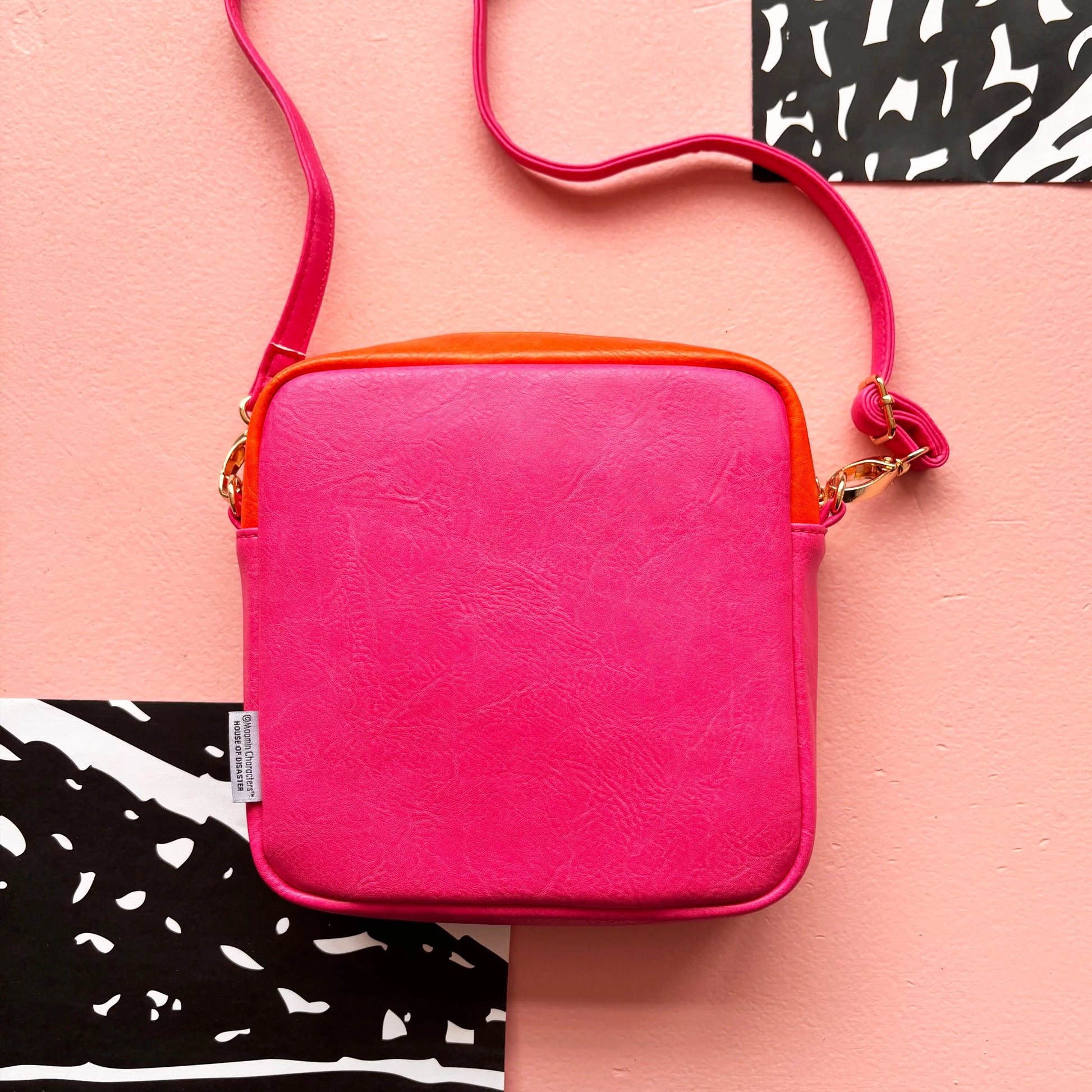 Back view of Moomin Snorkmaiden Mini Bag in hot pink vegan leather.