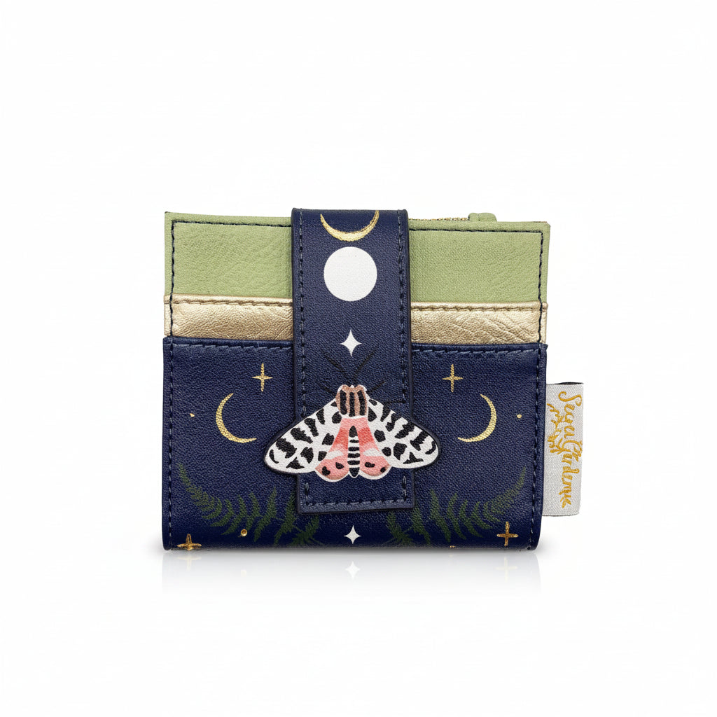 Front view of moth purse with moon and star detailing