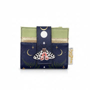 Front view of moth purse with moon and star detailing