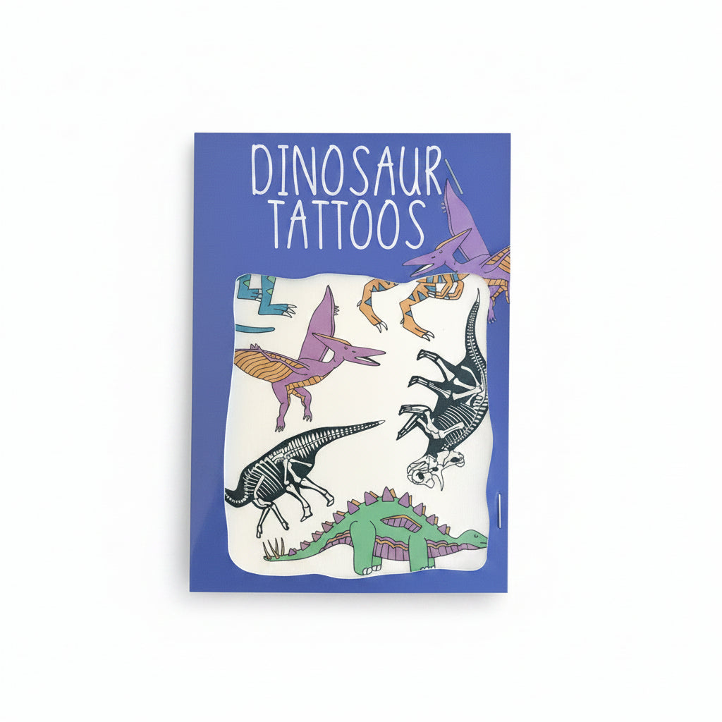 Dinosaur transfer tattoos pack held in a hand