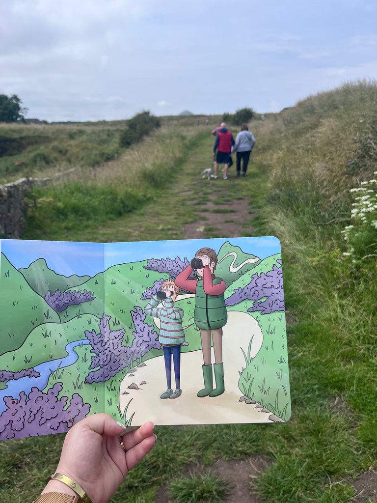 What Is A Haggis book spread held open on a countryside path