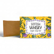 Neon Magpie Scottish Whisky vegan soap bar beside its thistle-print packaging box