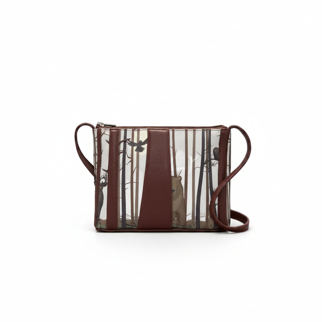 Brown Into The Wild cross body bag with cream forest scene featuring a stag and birds among trees