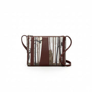 Brown Into The Wild cross body bag with cream forest scene featuring a stag and birds among trees