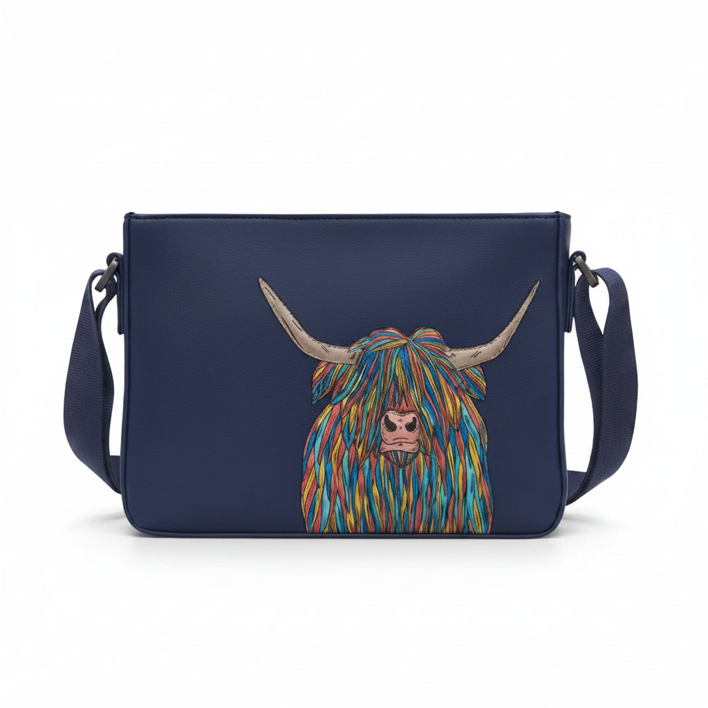 Highland cow cross body bag in navy vegan leather, front view on grey