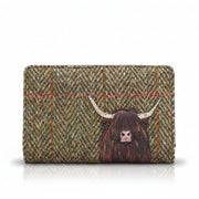 Highland cow flap-over purse in green tweed-effect vegan leather, front view on grey