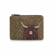 Highland cow zip-top purse in green tweed-effect vegan leather, front view on grey