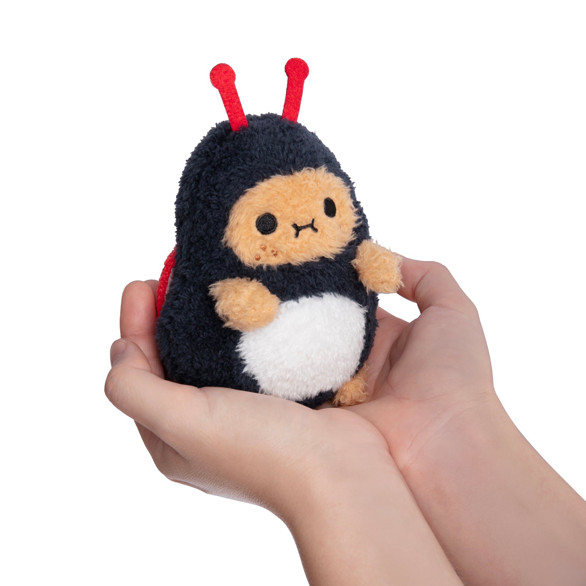 Beetle Ricespud plush toy close up of stubby embroidered hands