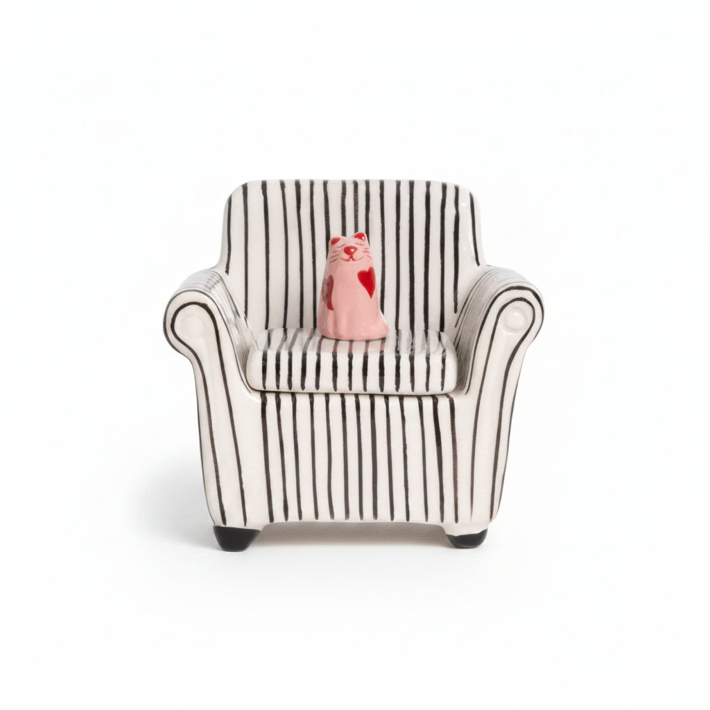 Front view of striped sofa trinket box with pink cat