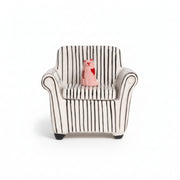 Front view of striped sofa trinket box with pink cat