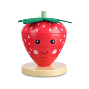 Strawberry wooden stacking ring on a pure white background