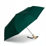 Forest green compact duck umbrella open side view on light background