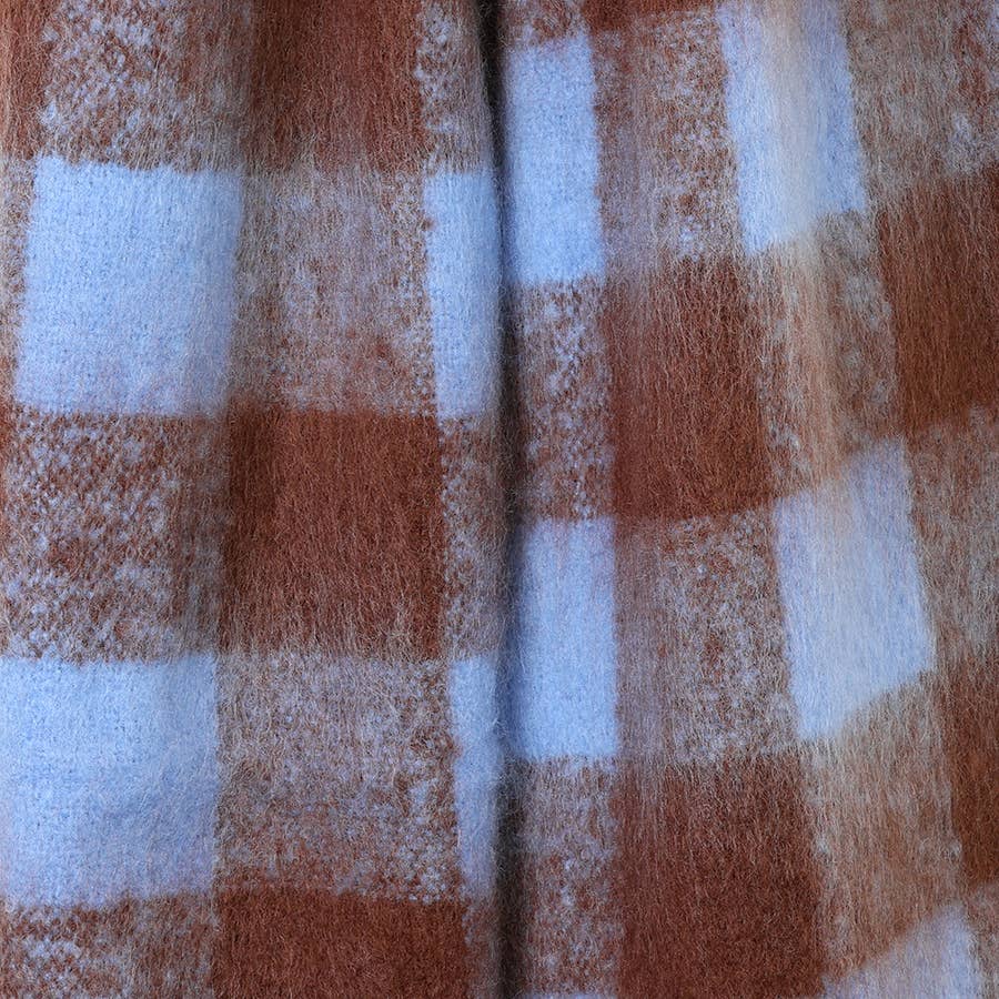 Close-up of the soft brown and pale blue check fabric