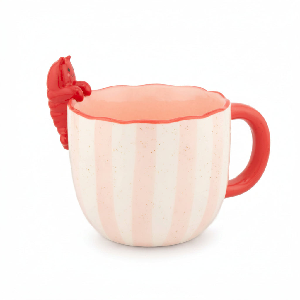 Coral pink ceramic mug with lobster claw handle design