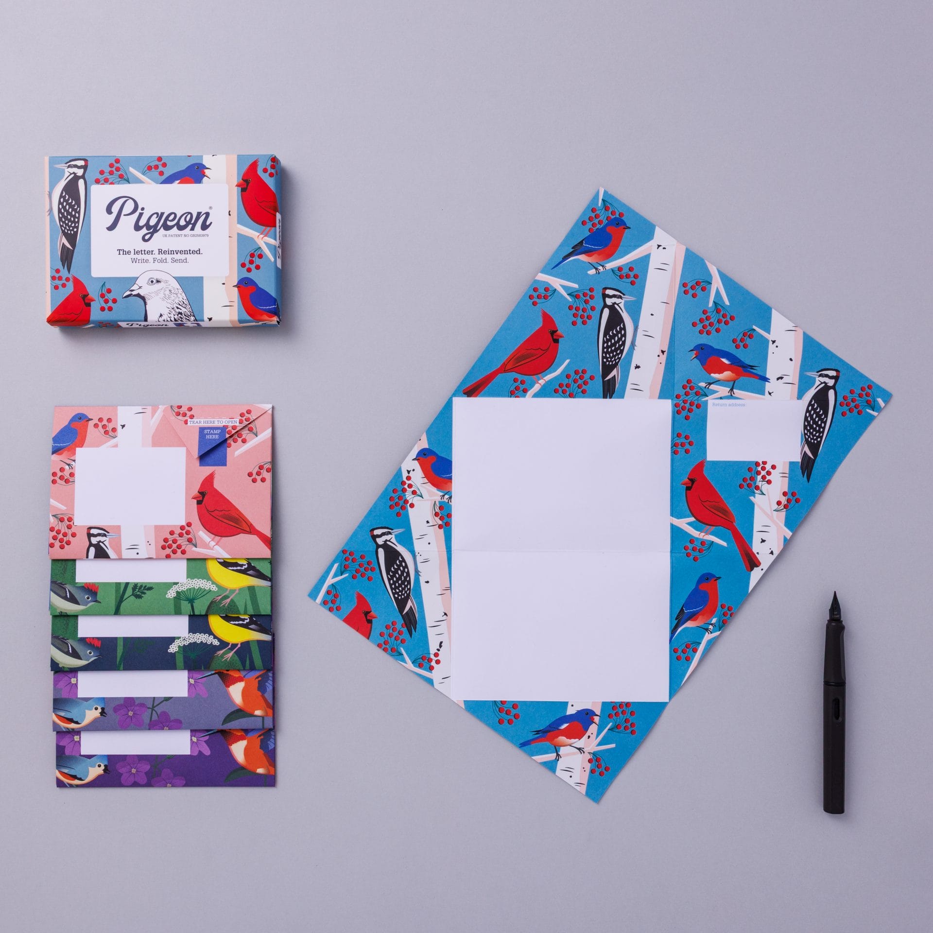 Pack and unfolded Pigeon showing colourful bird design on lavender background