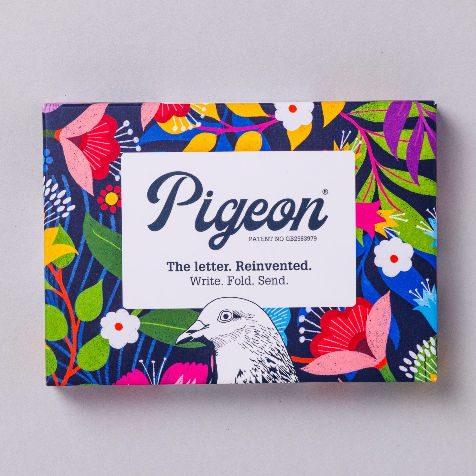 Floral Fantasia Pigeons pack front with tropical flowers on navy background