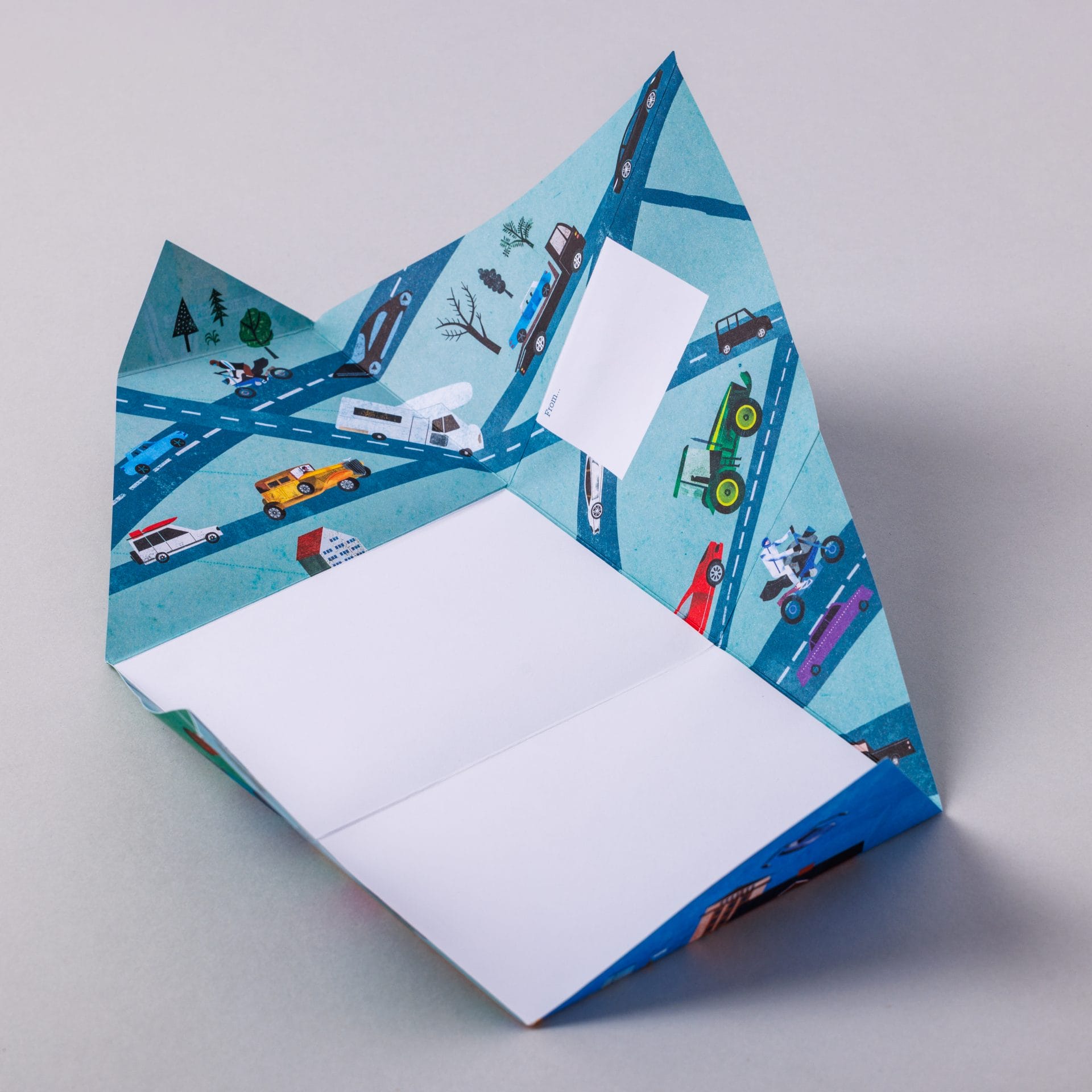 Unfolded Hop on Board Pigeon with vehicle and landscape design on grey background
