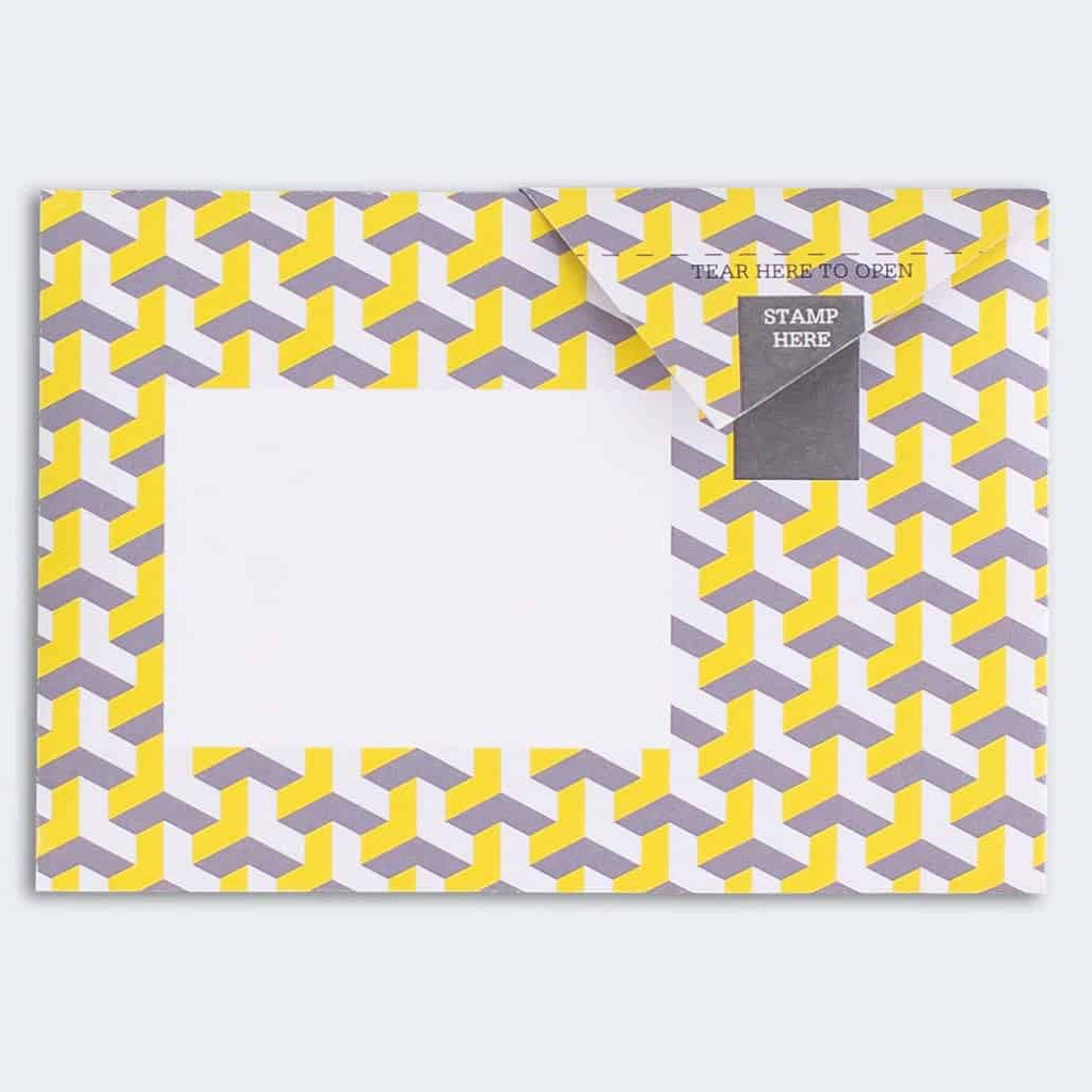 Folded Pigeon letter with geometric cube design in warm tones sixth variant
