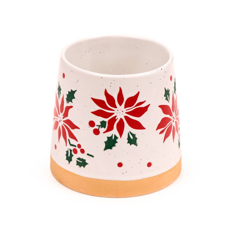 Close-up of Poinsettia Stoneware Mug handle showing fine ceramic texture and detailed red poinsettia print.