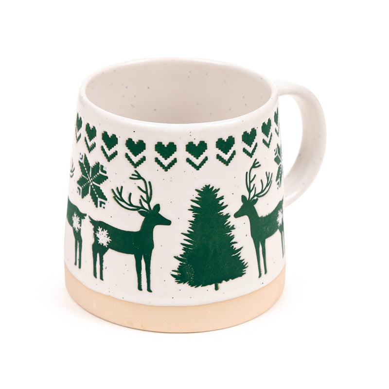 Green reindeer stoneware mug at an angle showing the bare clay foot