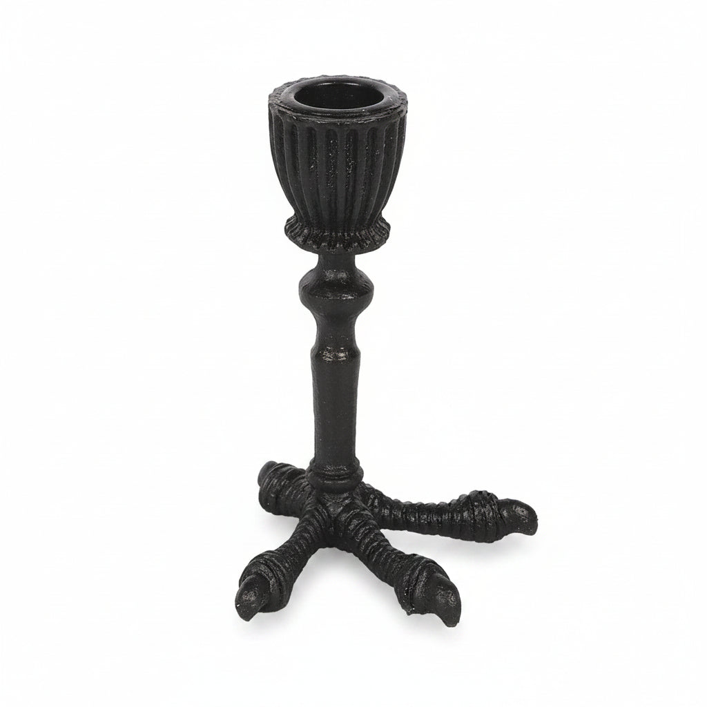 Black raven claw shaped candle holder showing talon detail