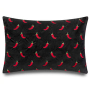 Chillies embroidered black velvet cushion front on a white background