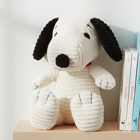 Snoopy ECO corduroy cream soft toy on wooden shelf with books