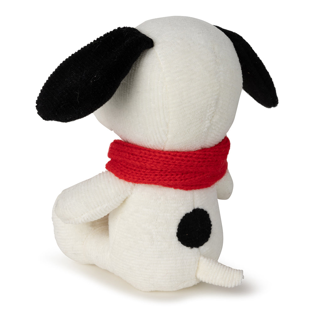 Snoopy with scarf back view showing black spot on white background