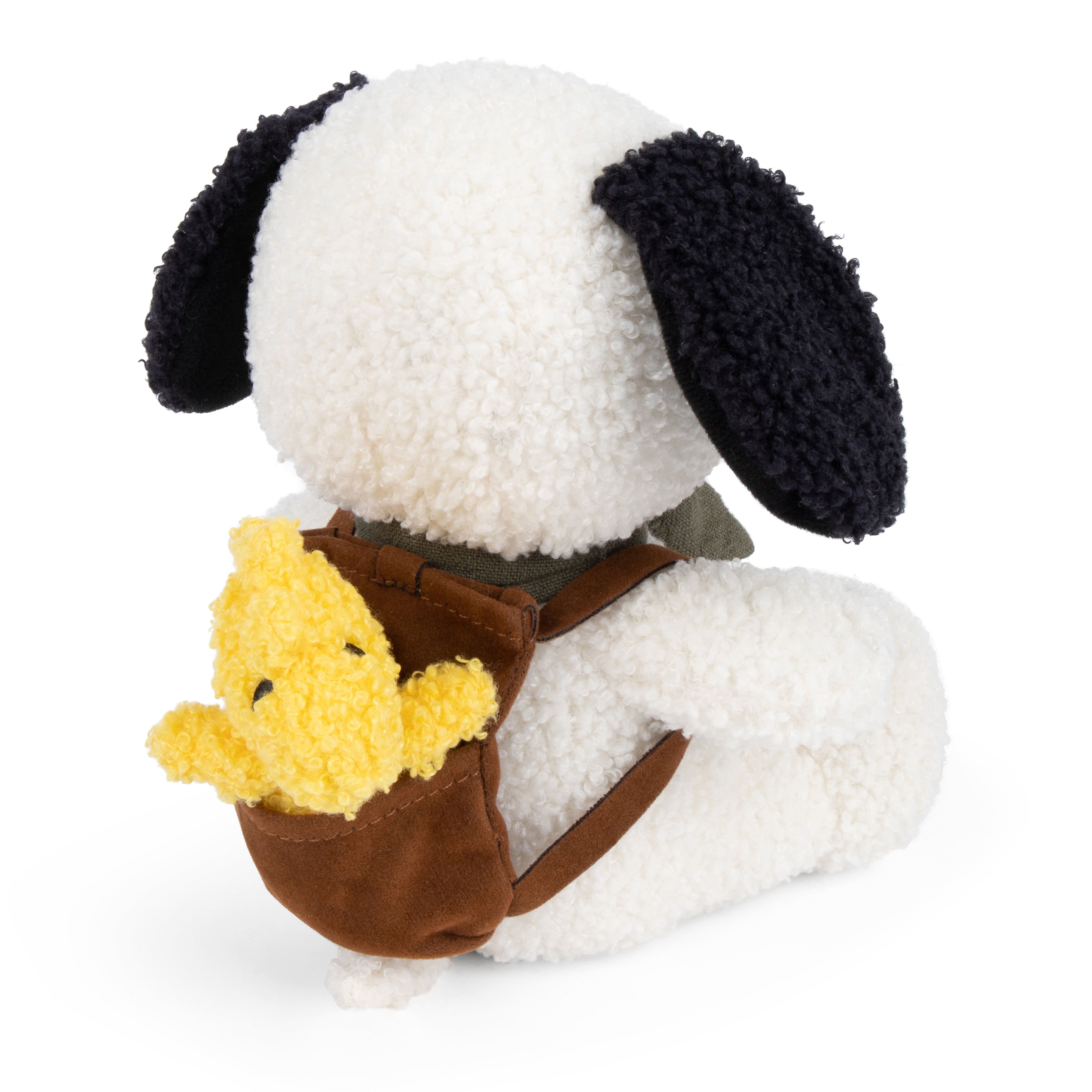Close-up of Woodstock in brown backpack on Snoopy white background