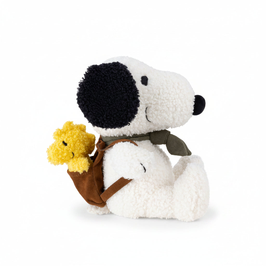 Snoopy soft toy side view with Woodstock in brown backpack