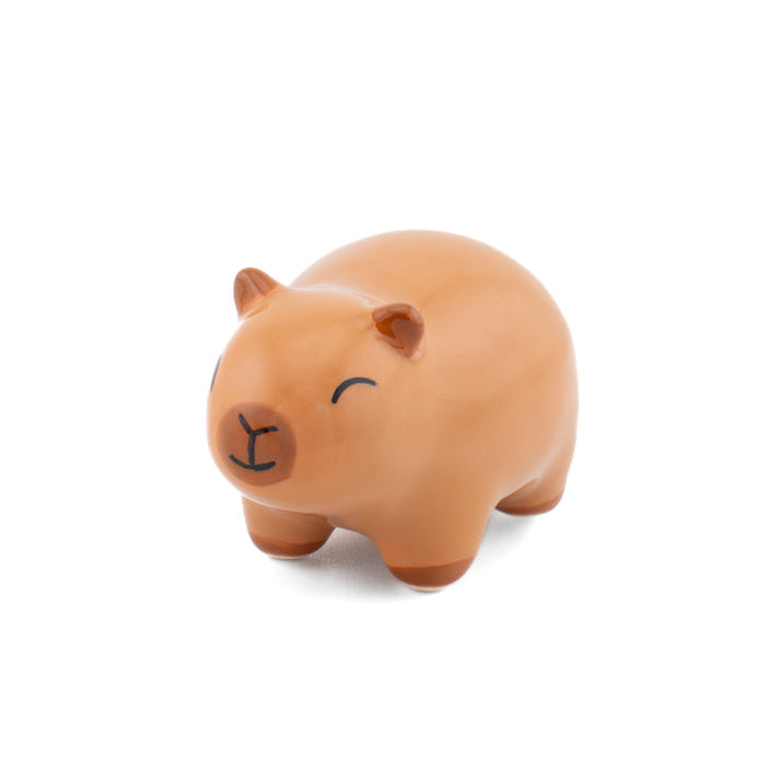 Capybara ceramic token front view on white background