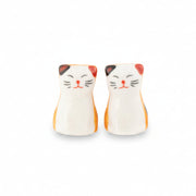 Cat chopstick rests, pair of white and ginger porcelain cats, on white background