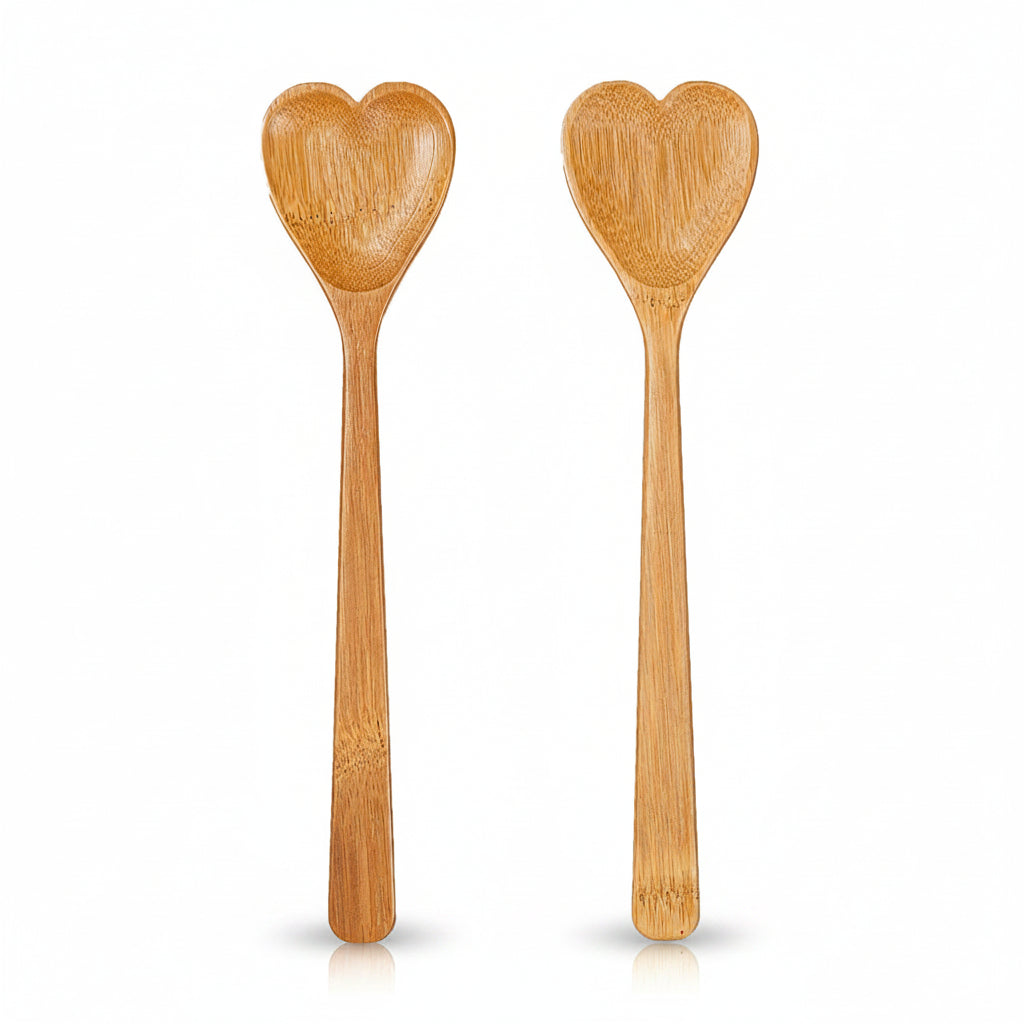 Heart bamboo salad servers, pair with heart-shaped ends, on white background