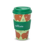 Highland Cow Travel Coffee Cup with green silicone lid on a pure white background