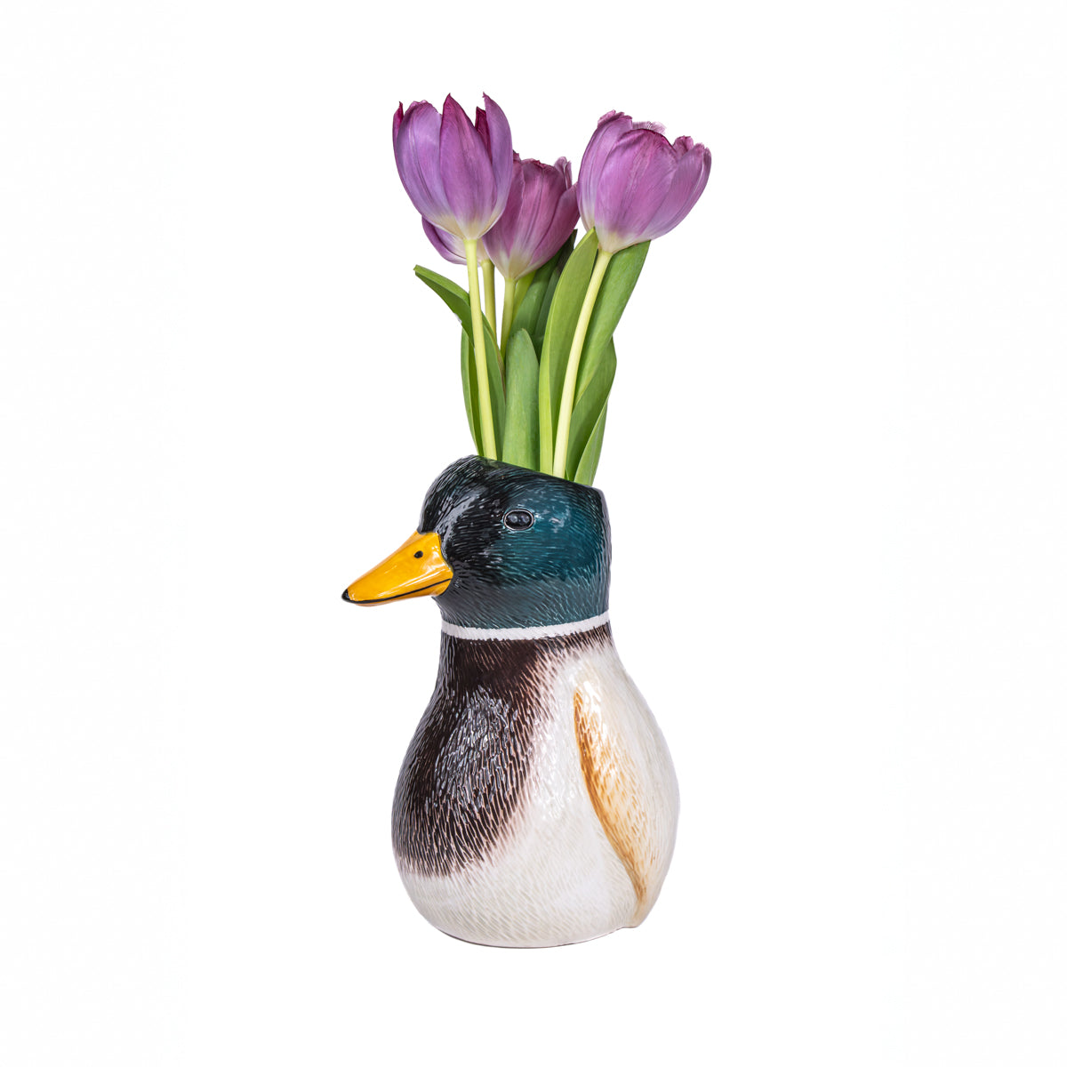 Duck vase with purple tulips angled view on white background