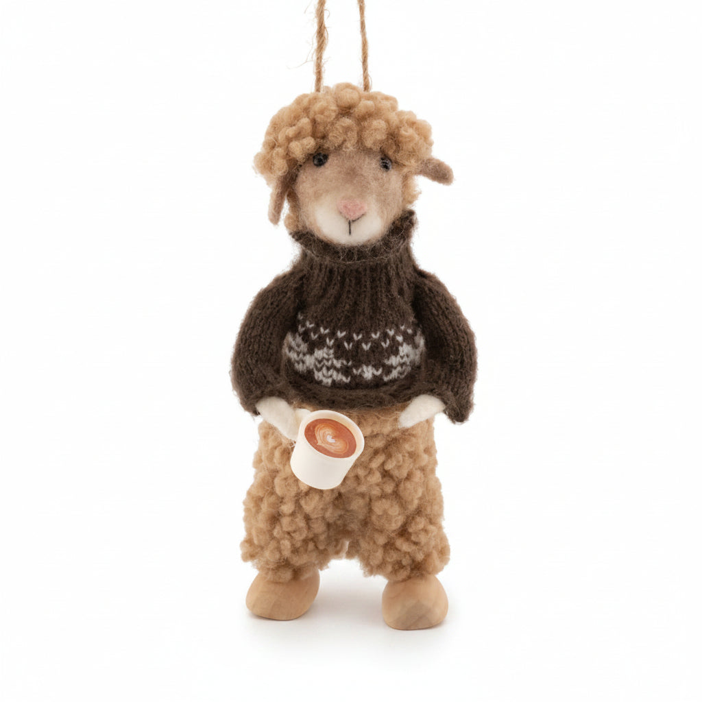 Felt sheep decoration in a knitted jumper holding a coffee cup