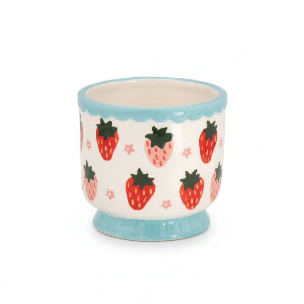 Strawberry mini planter, cream ceramic pot with strawberry print and blue rim, on white